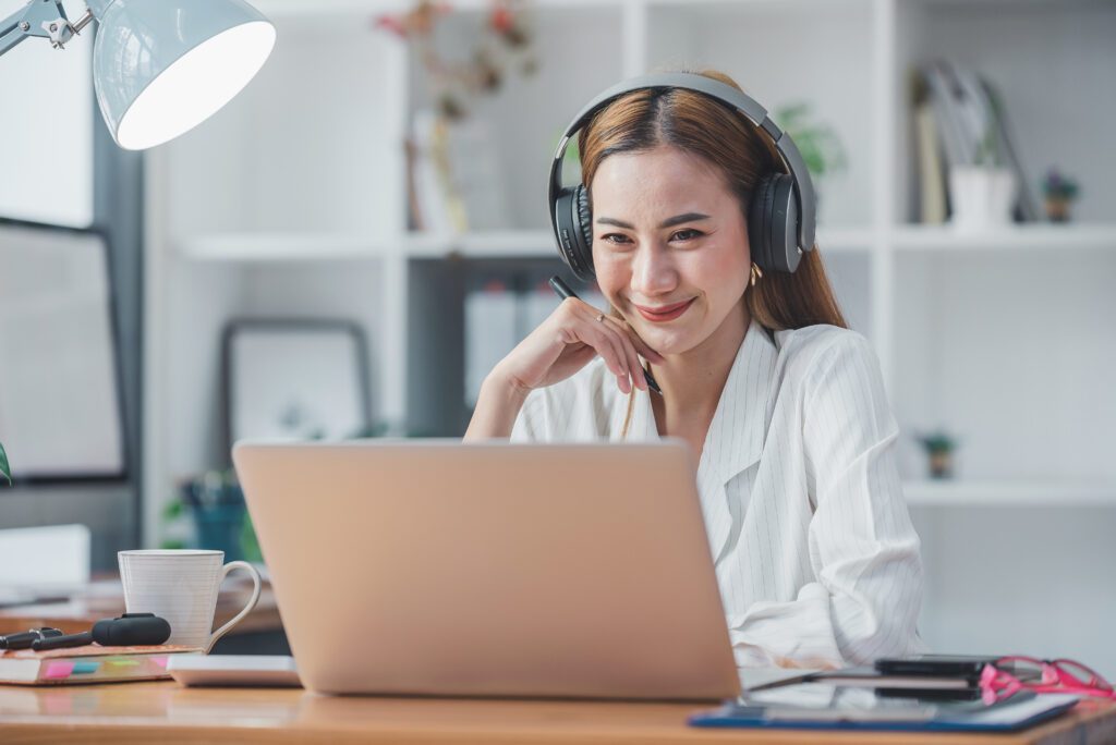 asian girl happy and charming wear headphones to c 2023 11 27 05 19 27 utc scaled